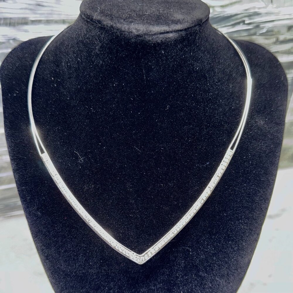 Silver "V" shaped "slip on" choker necklace with inset crystals